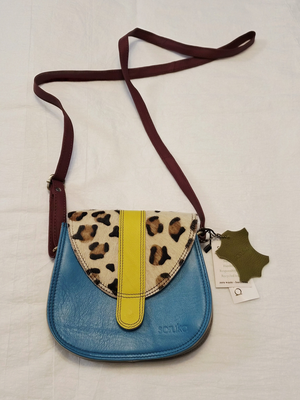 Santiko Blue Leather Crossbody with Leopard-Print Flap and Yellow Accent